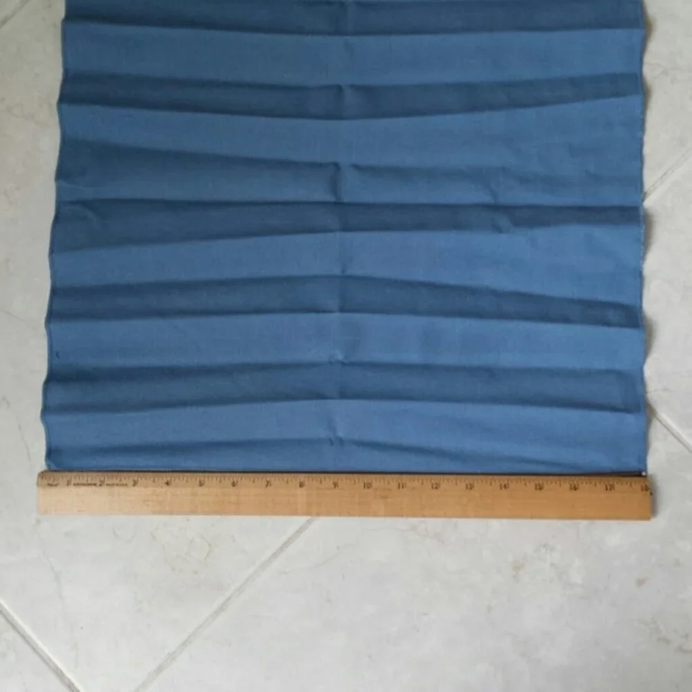 Set of 4 blue napkins and napkin rings